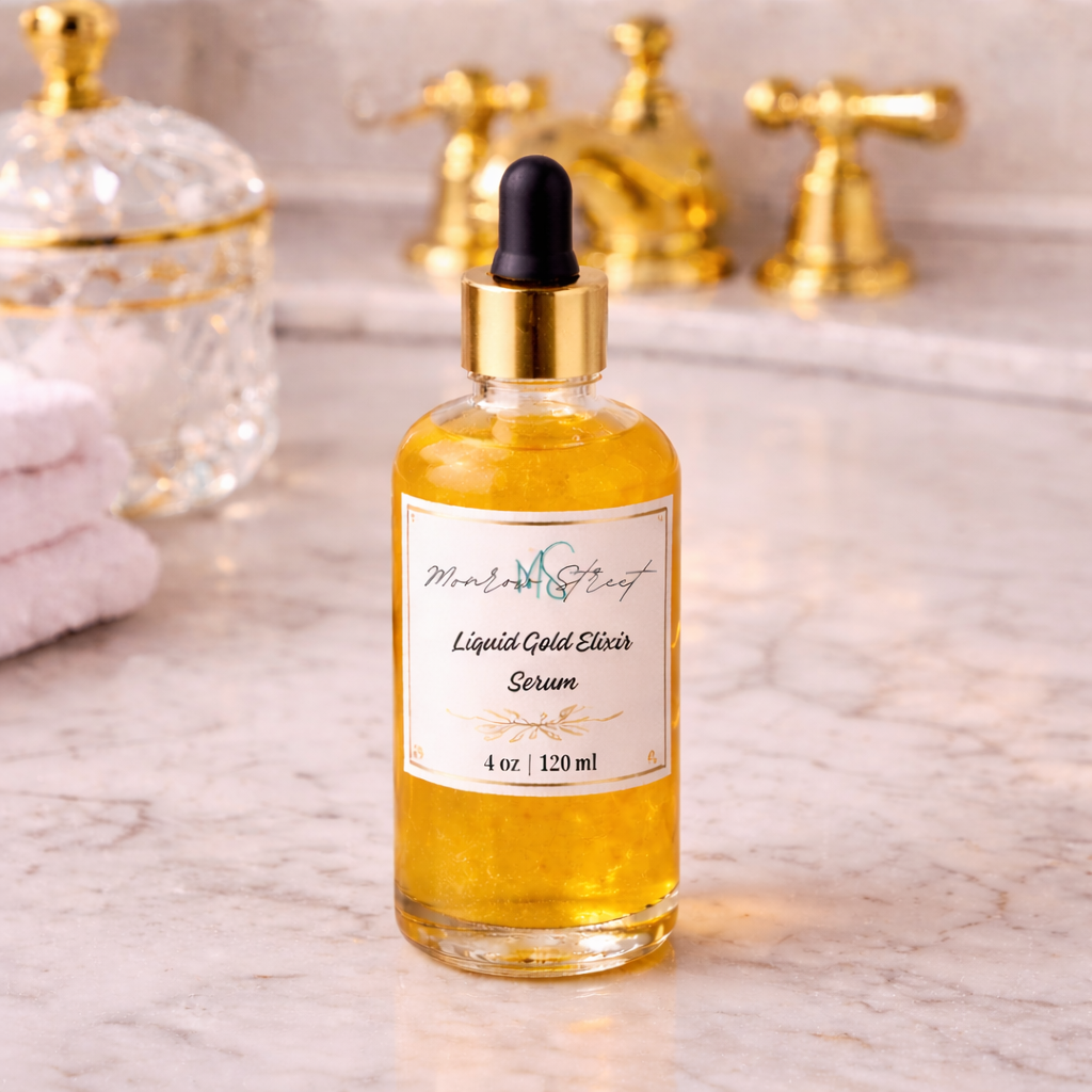 Bottle of 'Liquid Gold Elixir Serum' on a marble countertop with gold faucet in the background